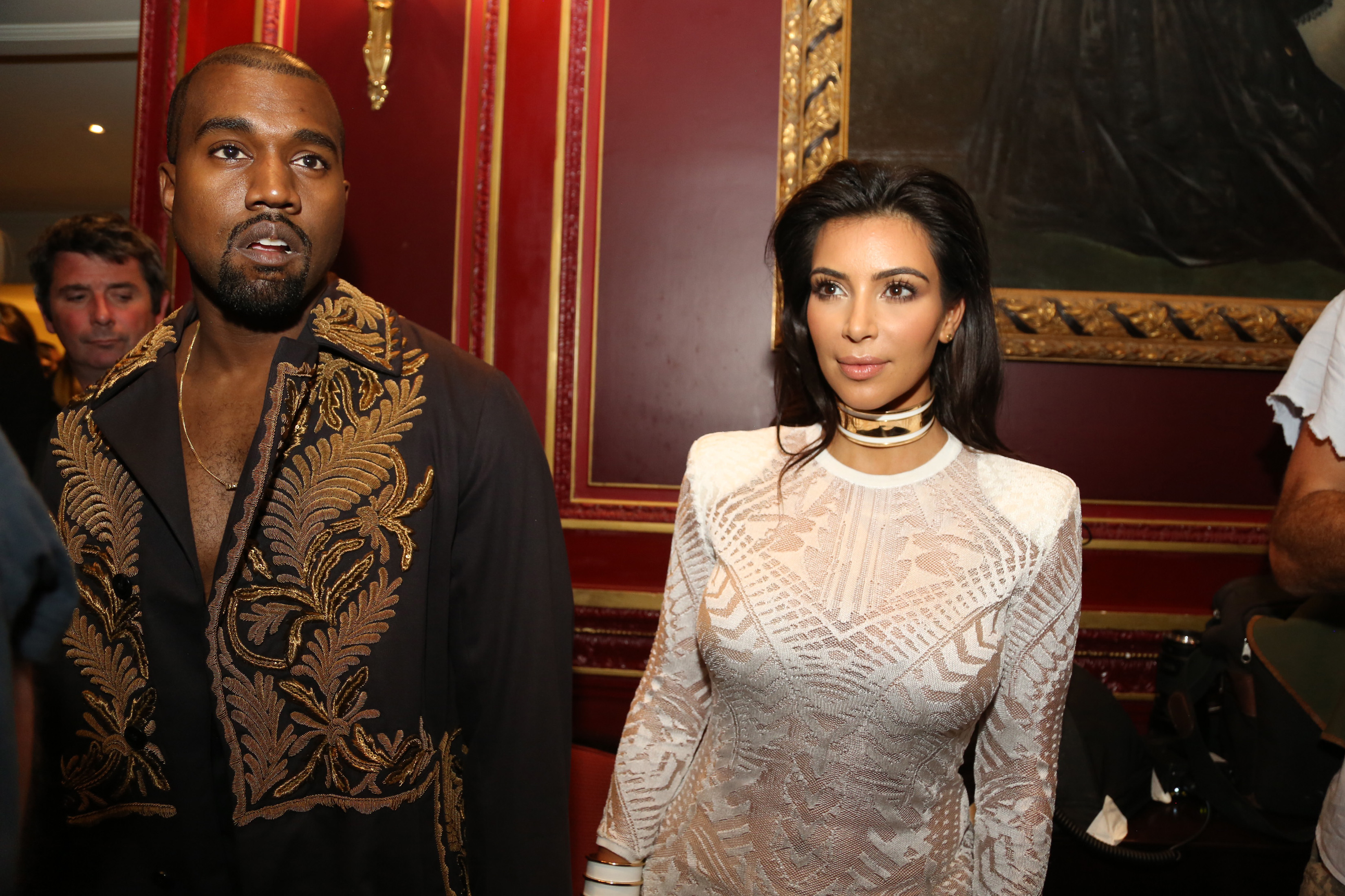 PARIS, FRANCE - SEPTEMBER 25: Kim Kardashian and Kanye West attend the Balmain show as part of the Paris Fashion Week Womenswear Spring/Summer 2015 on September 25, 2014 in Paris, France. (Photo by Antonio de Moraes Barros Filho/WireImage)
