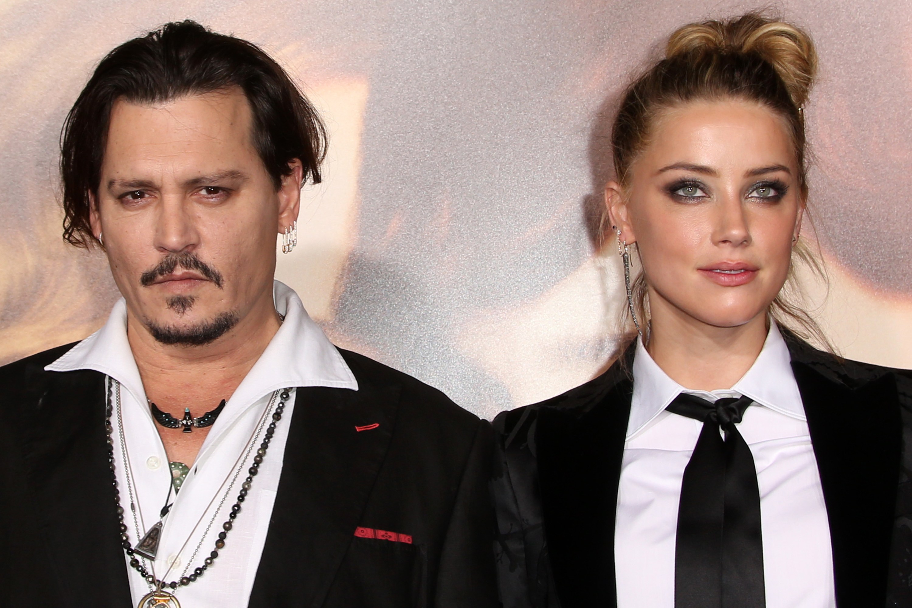 Amber Heard's Texts with Johnny Depp's Assistant Indicate Domestic Violence
