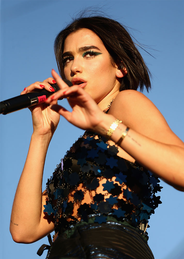 STYLECASTER | Celebs Who Elevated the Basic Cat Eye | Dua Lipa