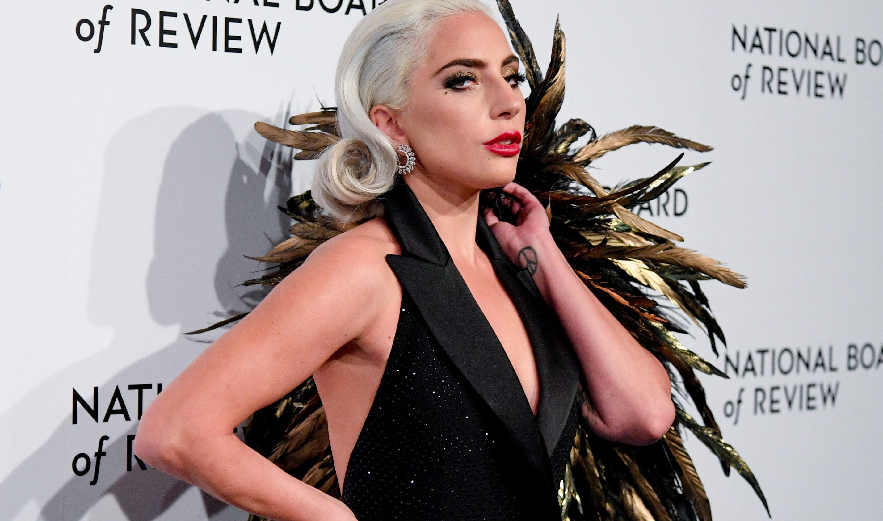 Lady Gaga's Feather Clutch Is Bigger Than My Head