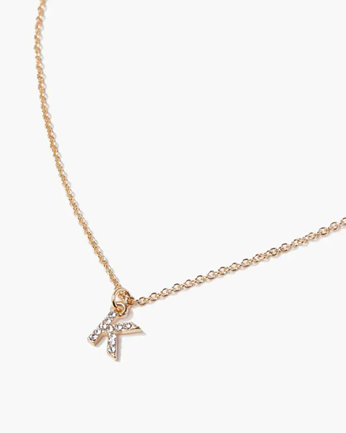 STYLECASTER | Word and Name Jewelry Is Having a Moment, Because Carrie Bradshaw Is a Forever Fashion Icon