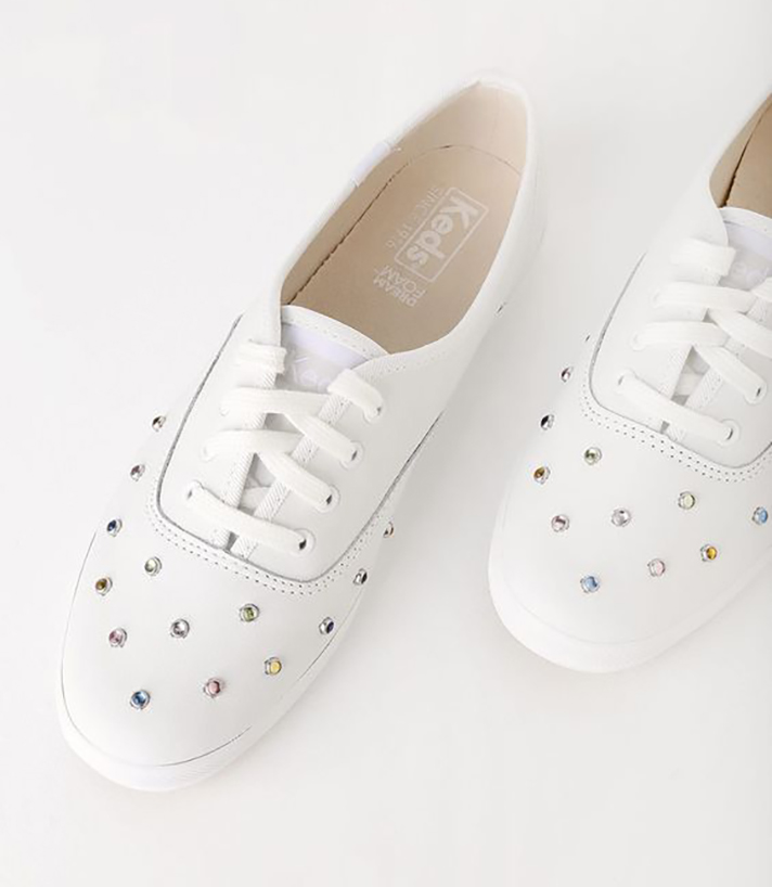 STYLECASTER | Dainty White Sneakers You Could Definitely Wear Under Your Bridal Gown