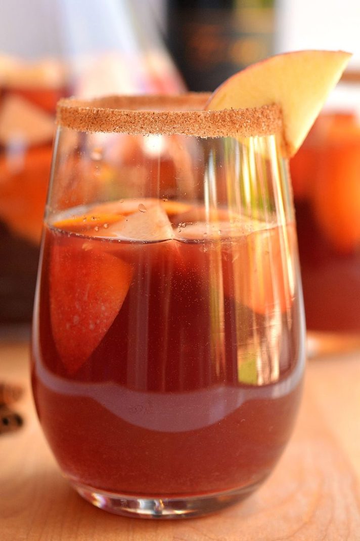 STYLECASTER | 17 Slow-Cooker Cocktails That'll Heat Up a Holiday Party | Autumn Sangria