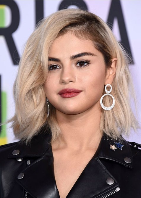 selena gomez dark roots blonde hair