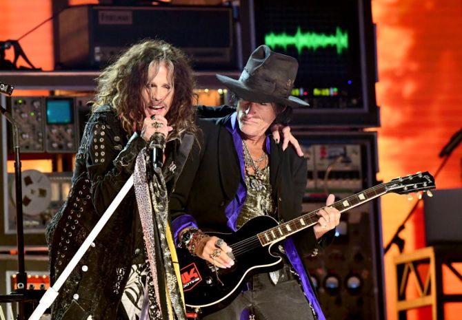 LOS ANGELES, CALIFORNIA - JANUARY 26: (L-R) Steven Tyler and Joe Perry of Aerosmith perform onstage during the 62nd Annual GRAMMY Awards at Staples Center on January 26, 2020 in Los Angeles, California. (Photo by Jeff Kravitz/FilmMagic)