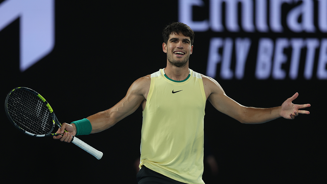 MELBOURNE, AUSTRALIA - JANUARY 24: Carlos Alcaraz of Spain celebrates winning the third set during their quarterfinals singles match against Alexander Zverev of Germany during the 2024 Australian Open at Melbourne Park on January 24, 2024 in Melbourne, Australia.