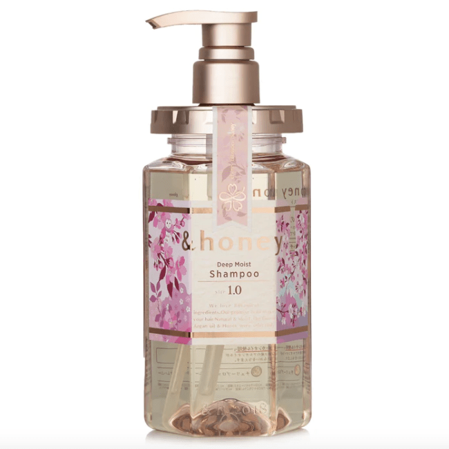 &Honey Deep Moist Cherry Blossom Honey Shampoo in a rose gold bottle with pink floral packaging