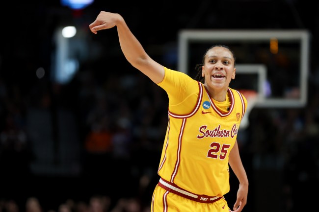 McKenzie Forbes #25 of the USC Trojans reacts after a three point basket during the first half against the Connecticut Huskies in the Elite 8 round of the NCAA Women's Basketball Tournament at Moda Center on April 01, 2024 in Portland, Oregon.