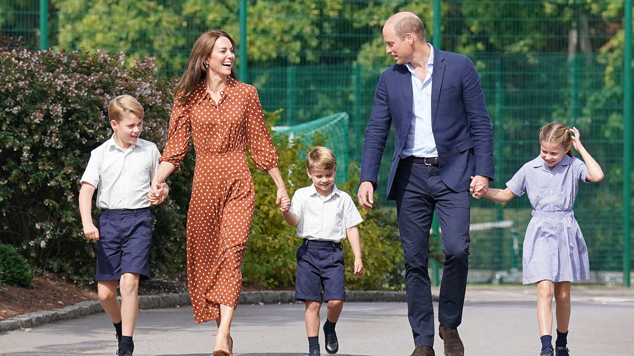 Prince George, Princess Charlotte and Prince Louis (C), accompanied by their parents the Prince William, Duke of Cambridge and Catherine, Duchess of Cambridge, arrive for a settling in afternoon at Lambrook School, near Ascot on September 7, 2022 in Bracknell, England. The family have set up home in Adelaide Cottage in Windsor's Home Park as their base after the Queen gave them permission to lease the four-bedroom Grade II listed home.