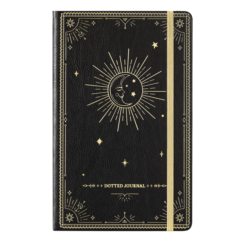 A black faux leather notebook with gold details, including a sun with a crescent moon inside it