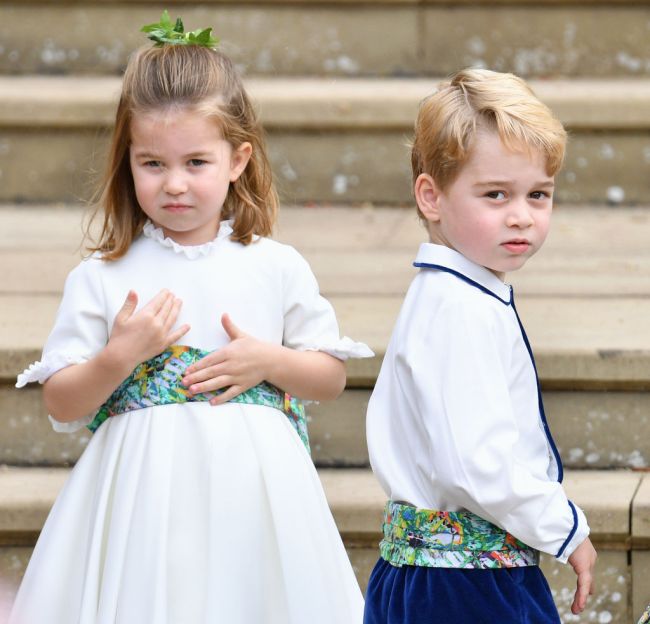 Princess Charlotte of Cambridge and Prince George of Cambridge attend the wedding of Princess Eugenie of York and Jack Brooksbank at St George's Chapel on October 12, 2018 in Windsor, England.