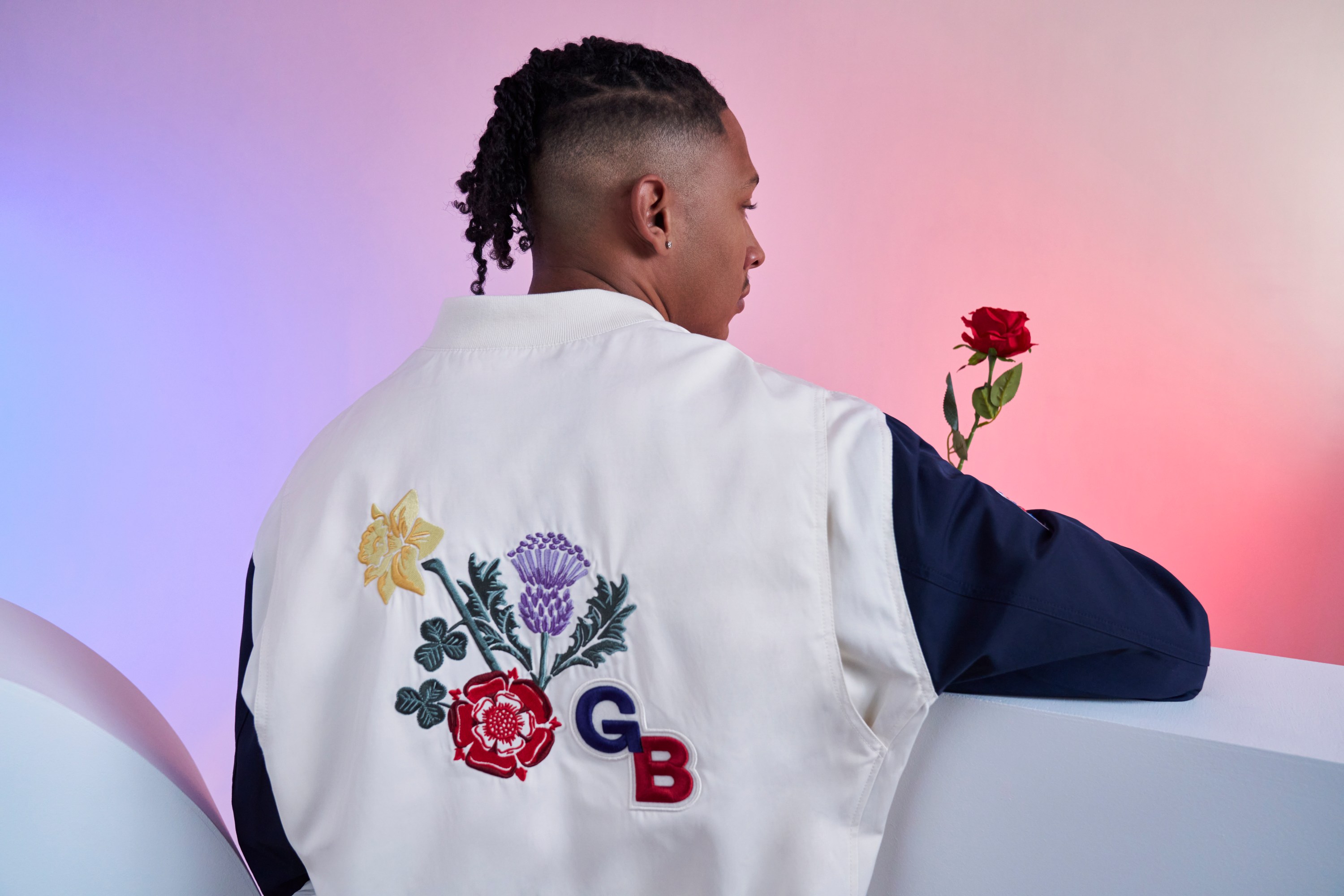 An athlete wears the Team GB jacket.