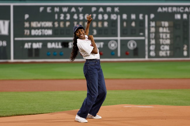 American comedian, writer, producer and actress Ayo Edebiri twists as she watches her first pitch before game two of a doubleheader between the Boston Red Sox and the New York Yankees at Fenway Park on September 14, 2023 in Boston, Massachusetts.