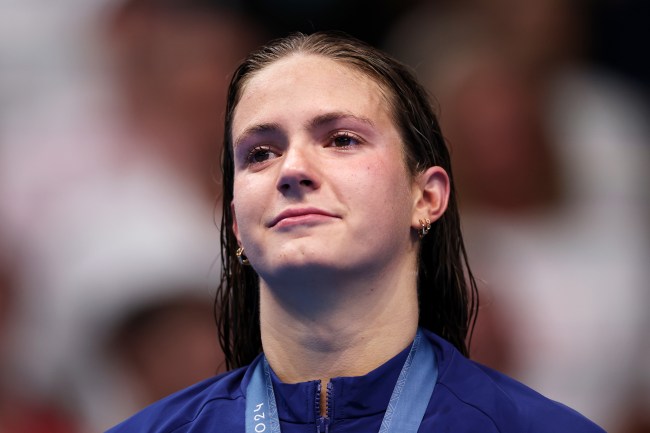 NANTERRE, FRANCE - JULY 29: Silver Medalist Katie Grimes of Team United States looks on as she stands on the podium during the Swimming medal ceremony after the Women’s 400m Individual Medley Final on day three of the Olympic Games Paris 2024 at Paris La Defense Arena on July 29, 2024 in Nanterre, France.