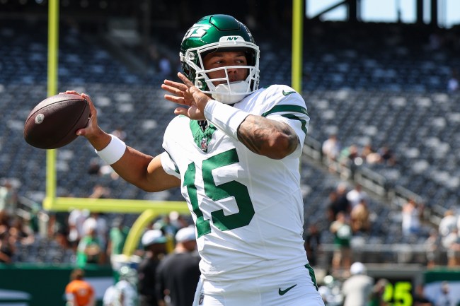 Adrian Martinez #15 of the New York Jets warms up prior to an NFL football game against the Washington Commanders at MetLife Stadium on August 10, 2024 in East Rutherford, NJ.