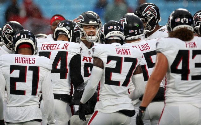 Desmond Ridder #9 of the Atlanta Falcons reacts with his team prior to the game against the Carolina Panthers at Bank of America Stadium on December 17, 2023 in Charlotte, North Carolina.