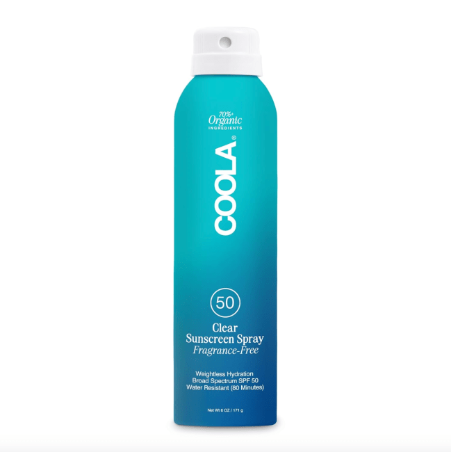 Coola Organic Sunscreen SPF 50 Sunblock Spray in an ombre blue bottle.