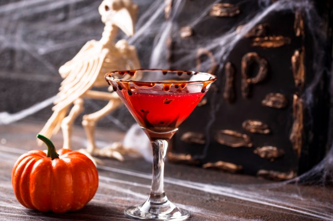 Halloweens drink red martini cocktail with candied rim