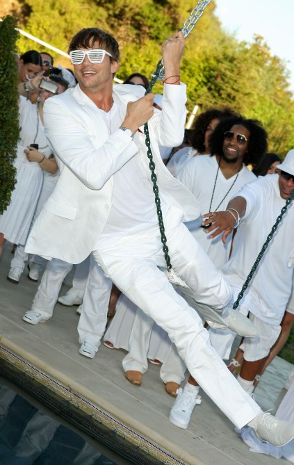 Actor Ashton Kutcher attends the White Party hosted by Sean "Diddy" Combs and Ashton Kutcher to help raise awareness for Malaria No More held at a Private Residence on July 4, 2009 in Beverly Hills, California.