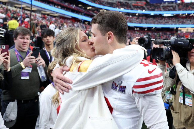 Brock Purdy #13 of the San Francisco 49ers kisses fiancee Jenna Brandt before Super Bowl LVIII against the Kansas City Chiefs at Allegiant Stadium on February 11, 2024 in Las Vegas, Nevada. 