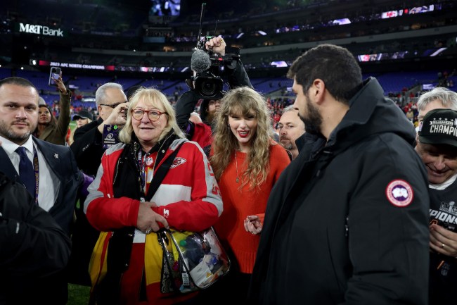Taylor Swift is seen on the field with Donna Kelce, mother of Travis Kelce #87 of the Kansas City Chiefs after the Chiefs'  17-10 victory against the Baltimore Ravens in the AFC Championship Game at M&T Bank Stadium on January 28, 2024 in Baltimore, Maryland.
