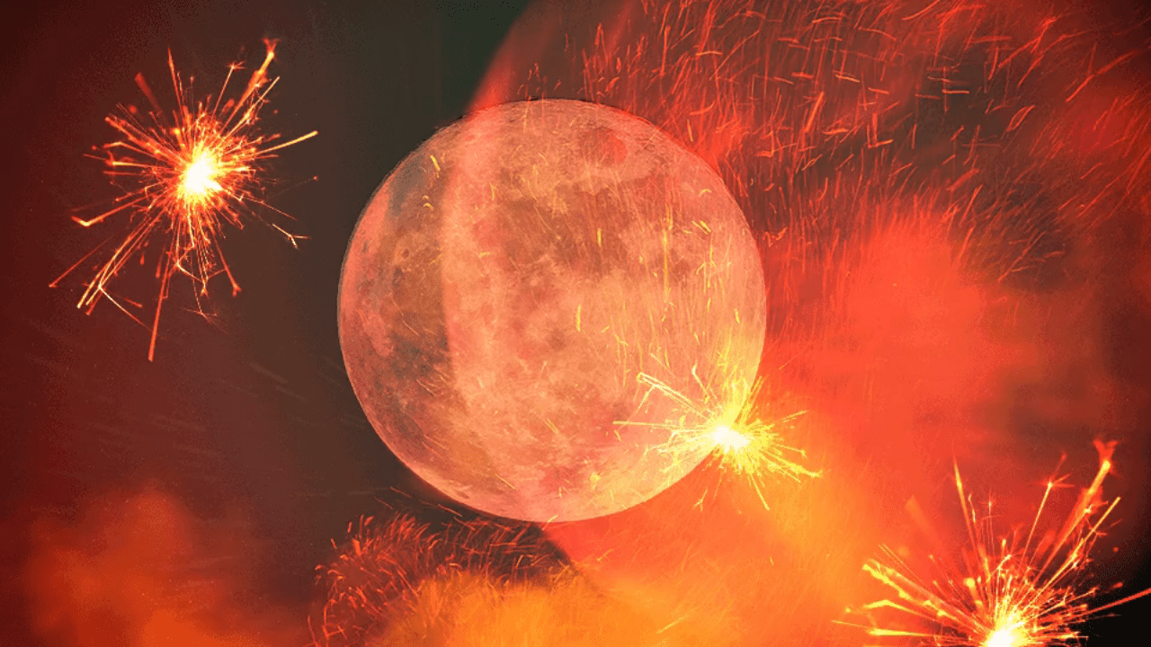 A moon in front of a fire red backdrop with sparklers