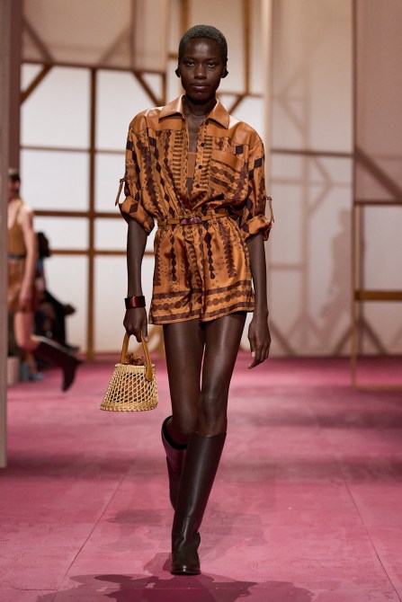 Hermes model wearing leather brown boots.
