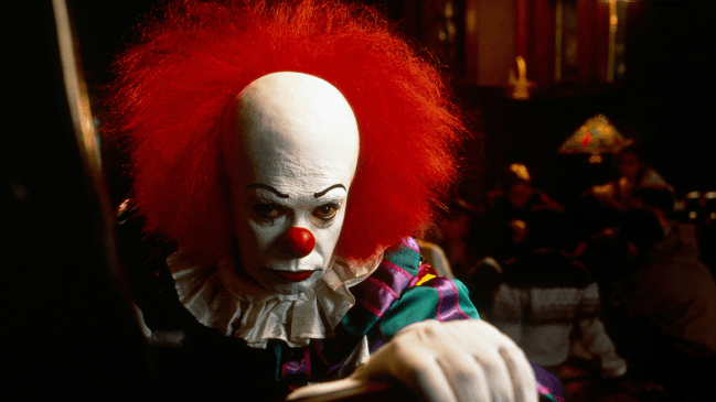 Tim Curry as Pennywise in "IT."