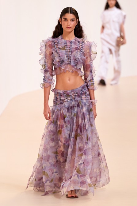 A model wearing a lavender two piece.