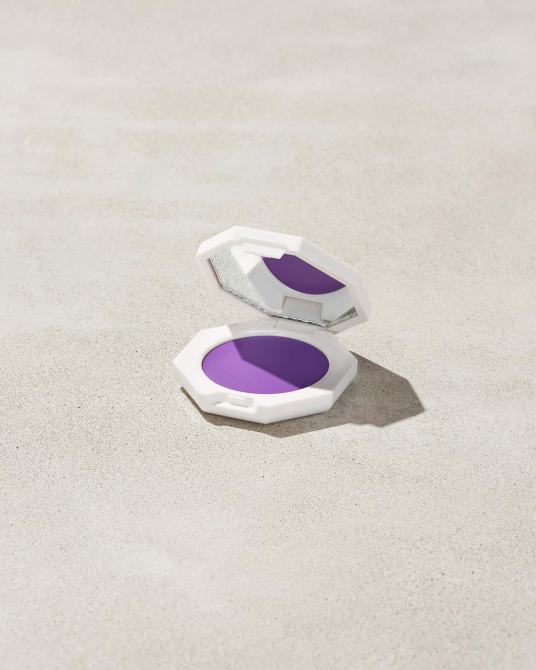 Cheeks Out Freestyle Cream Blush in a white compact.