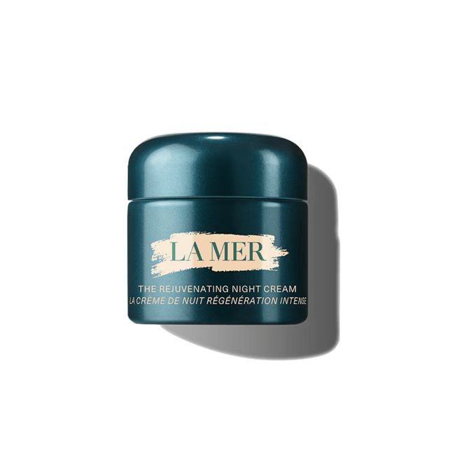 The Rejuvenating Night Cream in a green jar.