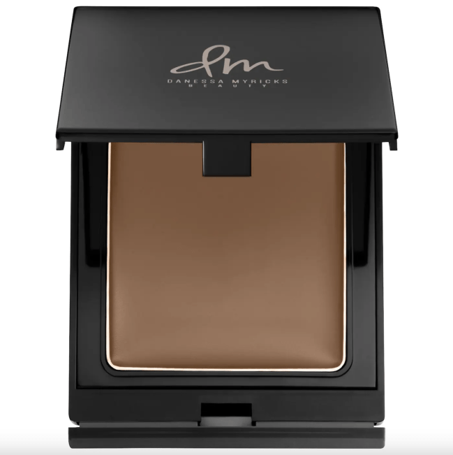 Danessa Myricks Beauty Balm Contour in a black compact.