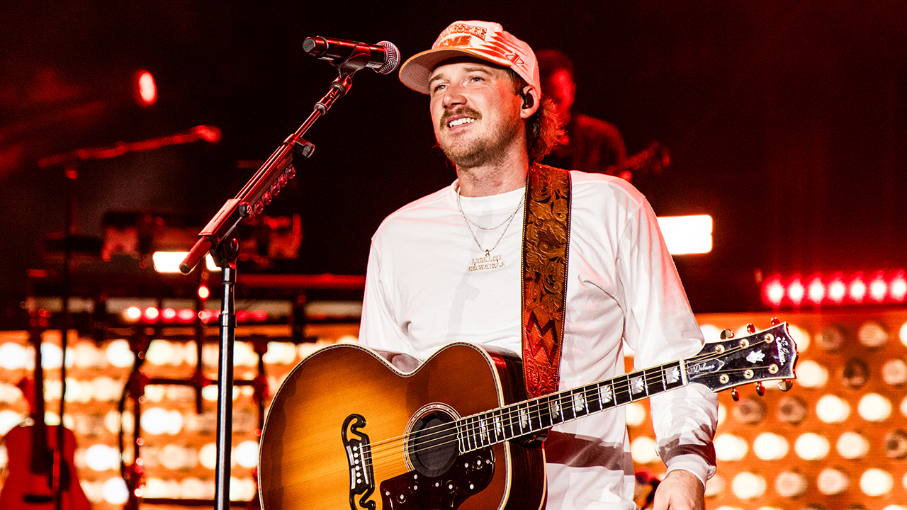 KNOXVILLE, TENNESSEE - SEPTEMBER 20: Morgan Wallen performs onstage for night one of his One Night At A Time tour at Neyland Stadium on September  20, 2024 in Knoxville, Tennessee.