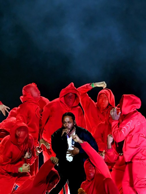NEW YORK, NY - JANUARY 28:  Recording artist Kendrick Lamar (C) performs onstage during the 60th Annual GRAMMY Awards at Madison Square Garden on January 28, 2018 in New York City.