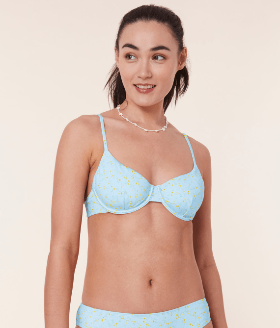 Andie The Bermuda Bikini Top in light blue and yellow flower colorway/pattern
