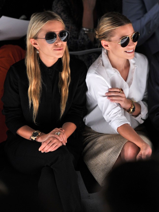 Mary-Kate Olsen and Ashley Olsen attend the J.Mendel Spring 2012 Fashion Show at Lincoln Center on September 14, 2011 in New York City. 