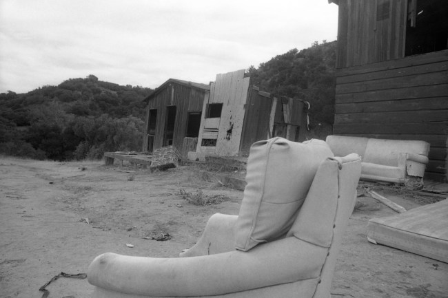 This is a typical abandoned cabin in Spahn Ranch, a former movie ranch north of Los Angeles, in which members of a hippie type commune lived at the time they were accused of participating in the mass murders of Sharon Tate and four other persons at the Tate home last Aug. 9th. Three persons are in custody as suspects in the bizarre killing.