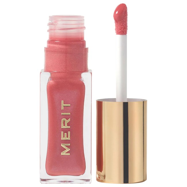 Merit Shade Slick Lip Oil in Pointelle in a clear tube.
