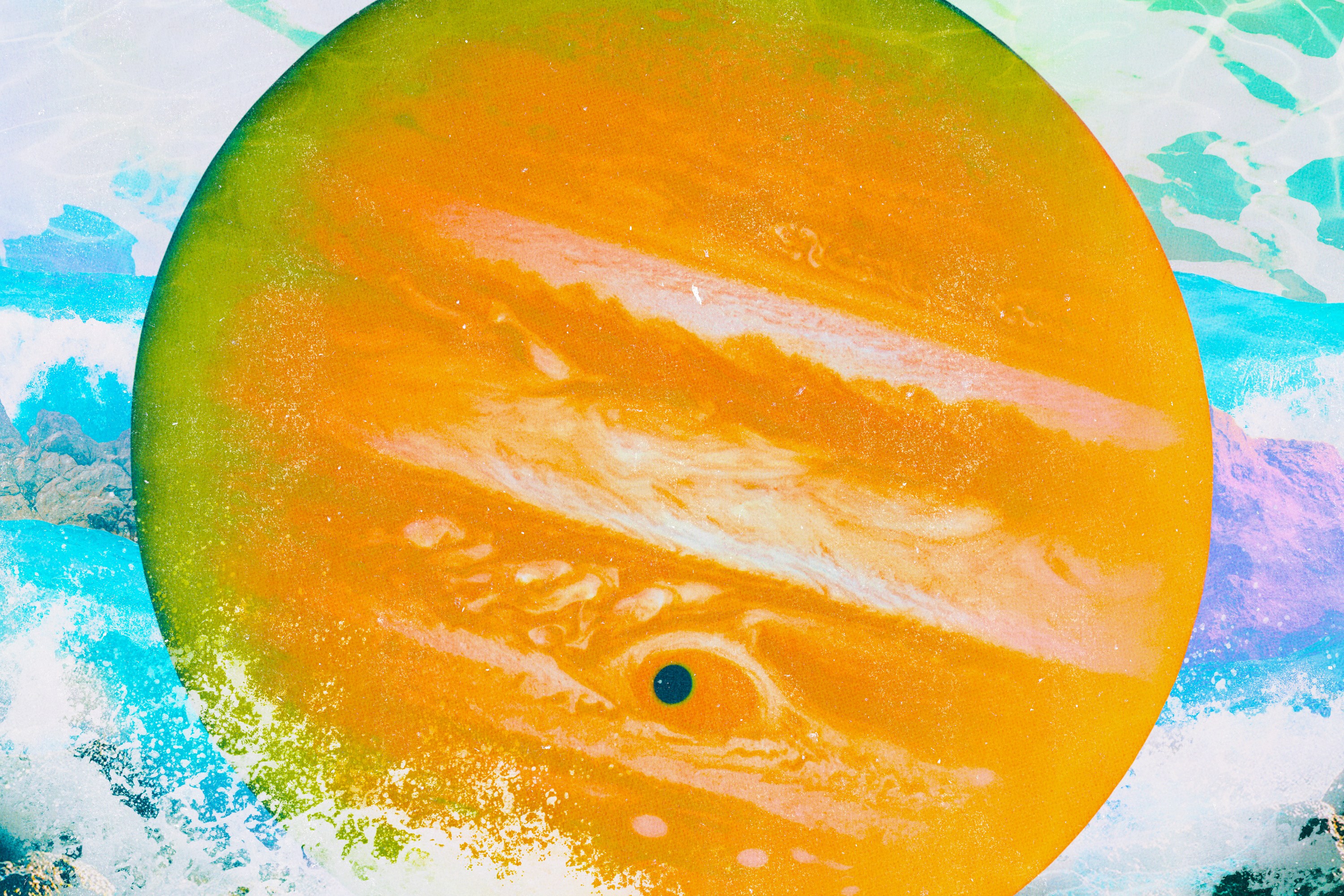 Planet Jupiter making a splash in the ocean