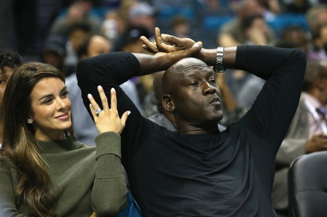 CHARLOTTE, NC - NOVEMBER 01:  (L-R) Yvette Prieto and her husband and owner of the Charlotte Hornets, Michael Jordan, watch on during their game against the Atlanta Hawks at Time Warner Cable Arena on November 1, 2015 in Charlotte, North Carolina. NOTE TO USER: User expressly acknowledges and agrees that, by downloading and or using this photograph, User is consenting to the terms and conditions of the Getty Images License Agreement.