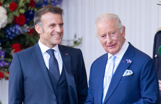 WINDSOR, ENGLAND - JULY 8: King Charles III and President Emmanuel Macron during the formal welcome at the Royal Dais on July 8, 2025 in Windsor, England. President Emmanuel Macron and Mrs Brigitte Macron visit the UK in the first visit State Visit made by France in 17 years. They are staying at Windsor Castle, hosted by King Charles III and Queen Camilla, and a banquet will be held there in their honour. The Macrons will visit Imperial College, and the President will address Parliament during his stay.