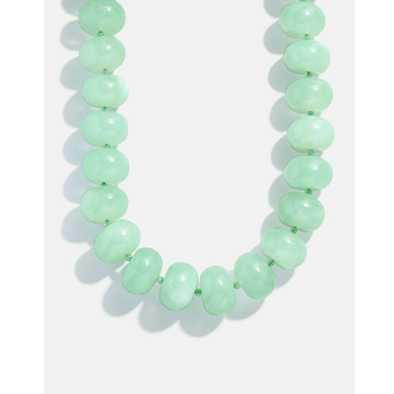 How to Layer Necklaces According to a Stylist