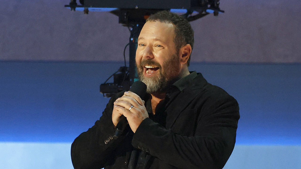 NASHVILLE, TENNESSEE - NOVEMBER 19: EDITORIAL USE ONLY Bert Kreischer speaks onstage during the 59th Annual CMA Awards at Bridgestone Arena on November 19, 2025 in Nashville, Tennessee.